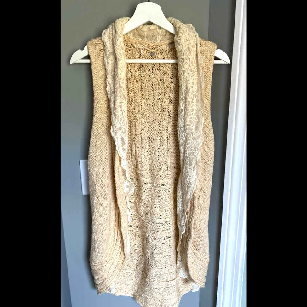 Knitted and knotted sweater from Anthropologie in like new condition